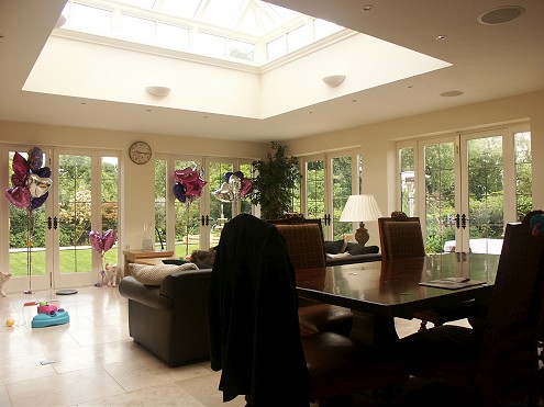 Extension with glass atrium Extension with glass atrium